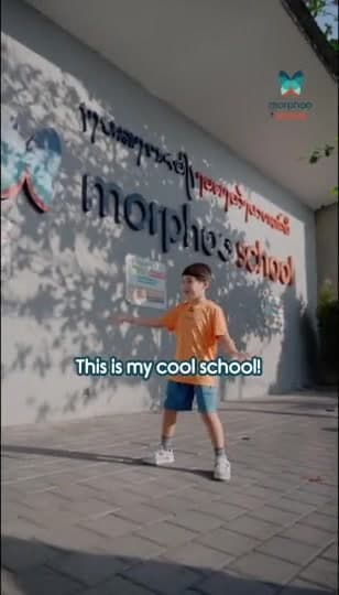 A pupil in an orange Morphoo School T-shirt shows his school: the entrance, the football pitch, the basketball court, the swimming pool, the computer room, the cooking class and a classroom, with his own words as captions, ending on the Morphoo School logo